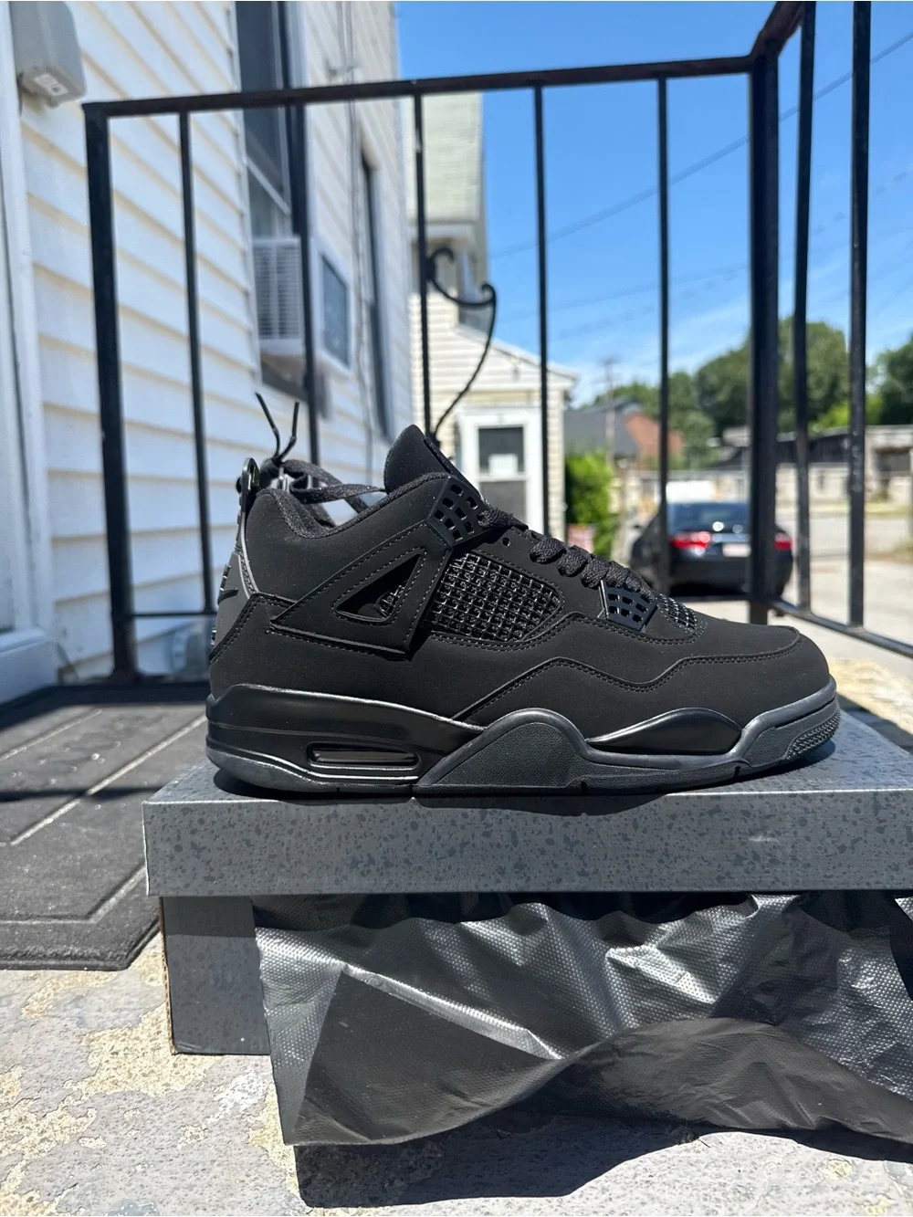 Jordan Men’s Black Retro 4 Sneakers
